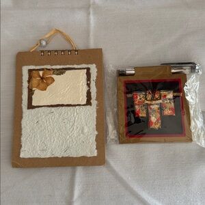 Set of 2 museum quality notepads.